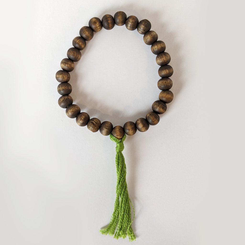 Wooden Bead Bracelets - hand made with green tassel for heart chakra