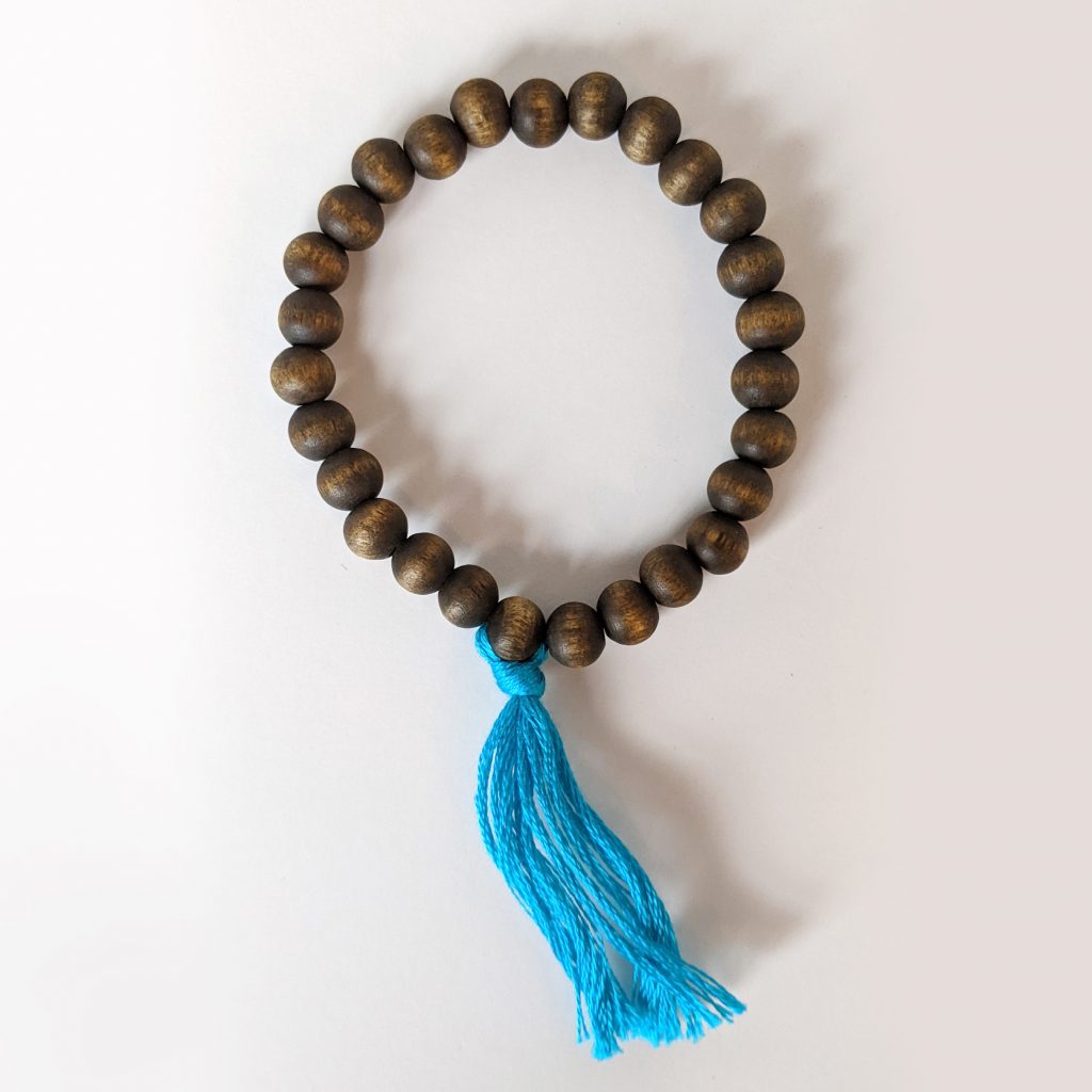 Wooden Bead Bracelets - hand made with aqua tassel for throat chakra